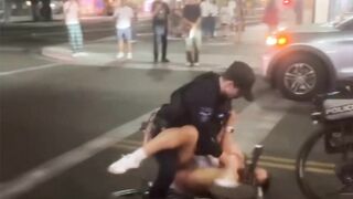 Arizona State cheerleader being shoved to ground, pummeled by cops