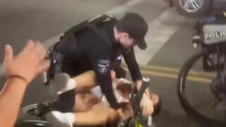 Arizona State cheerleader being shoved to ground, pummeled by cops