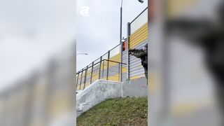 NOT AI-Russian soldier shoots down Ukrainian drone flying over a busy Moscow highway