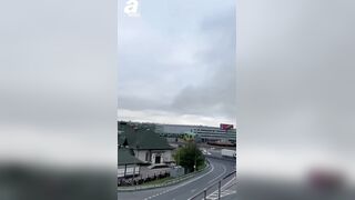 NOT AI-Russian soldier shoots down Ukrainian drone flying over a busy Moscow highway