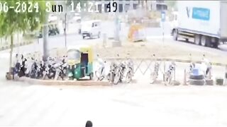 The Girl in the Pink is the One the Bull Wants. Boyfriend Stops his Bike Why?