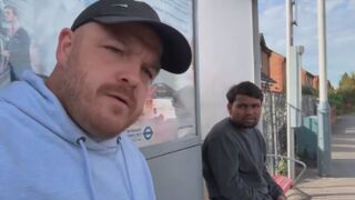 YouTuber Confronts Asylum Seeker Sitting at a Bus Stop Near London Hotel
