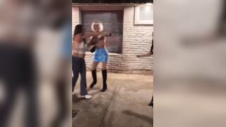 ladies in mini skirts fight it out