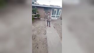 Woman Seen allegedly applying dog feces to wall to deter people from climbing over