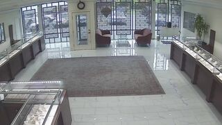 Washington jewelry store owner opens fire after would-be thieves ram truck through storefront