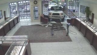 Washington jewelry store owner opens fire after would-be thieves ram truck through storefront