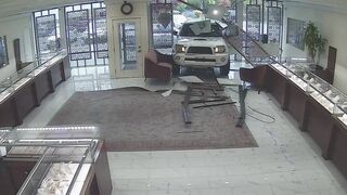 Washington jewelry store owner opens fire after would-be thieves ram truck through storefront