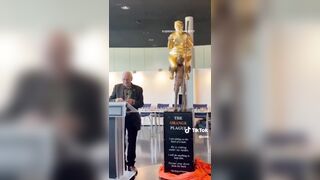 Golden statue of naked Trump called 'Orange Plague' appears at European Parliament