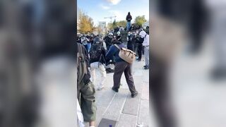 Protester Knee-Struck in the Face During Arrest