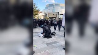 Protester Knee-Struck in the Face During Arrest