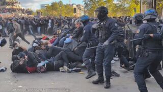 Continued clashes today in central Paris between riot police and far-left extremists