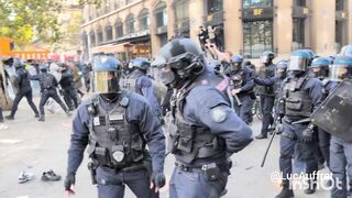 Continued clashes today in central Paris between riot police and far-left extremists