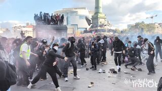Continued clashes today in central Paris between riot police and far-left extremists