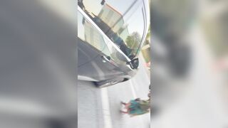 Leftist with bullhorn knocked down by federal SUV in Sacramento