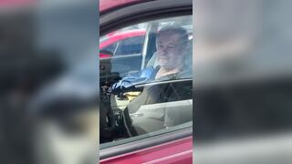 Confronted Driver Refuses to Leave Car After Racial Slurs