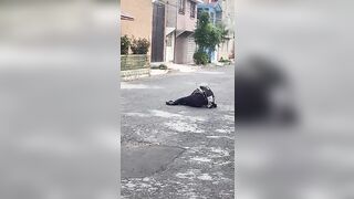 Man runs over Woman, drags her for several Meters and then Flees
