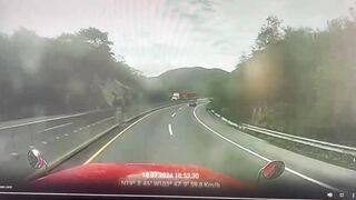 Woman in Red Pick-up makes Mistake with Big Rig on the Highway