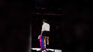 Harry Styles holds a Bisexual Pride flag on stage to announce a fans ‘coming out’