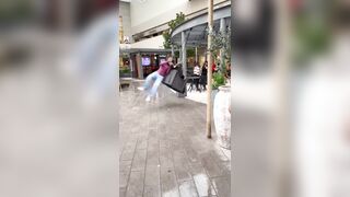 A swing in the middle of a shopping mall in Mexico violently struck a young woman