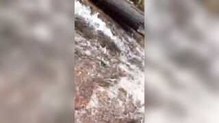 Woman Swept Away by Powerful Currents at Indonesia’s Robo Waterfall