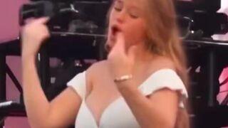 Sign Language Interpreter's Energetic WAP Performance Delights Viewers