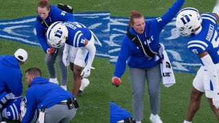A Duke football player SWATS at a female medical staff worker on the field