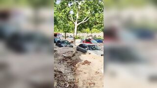 Flooding in Ecuador is so Bad, People have to Ride on Top of their Cars