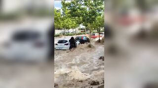 Flooding in Ecuador is so Bad, People have to Ride on Top of their Cars