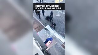 Another Rioter crashed by falling glass