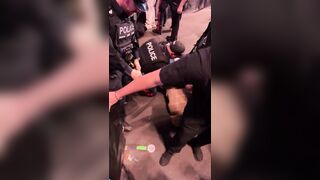 Police Officer Slams Man Headfirst to the Ground While Breaking Up UFC Edmonton Fight