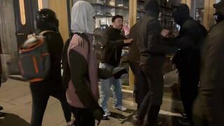 Islamist Demons saying “She is a Muslim sister. Don’t loot here, let’s go there!”