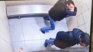 A fight inside a holding cell quickly turned into instant regret for the prisoner involved