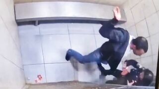 A fight inside a holding cell quickly turned into instant regret for the prisoner involved