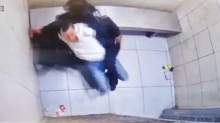 A fight inside a holding cell quickly turned into instant regret for the prisoner involved