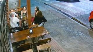 These People Enjoying Dinner are about to Change Plans