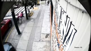 Watch the Guy trying to Get Away from the Out of Control Bus