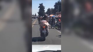Woman on Back of Bike Cucks her Boyfriend with the Man Behind Her