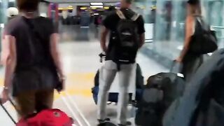 Sick Eco-clowns attack Heathrow Airport, London.
