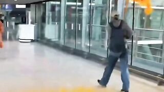 Sick Eco-clowns attack Heathrow Airport, London.