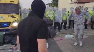 Double HIT: Rioter gets Hit by a Brick in the Face and in the Private Area..