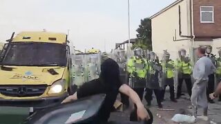 Double HIT: Rioter gets Hit by a Brick in the Face and in the Private Area..
