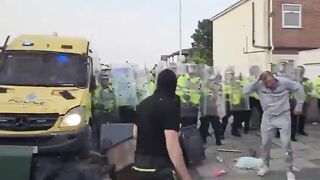 Double HIT: Rioter gets Hit by a Brick in the Face and in the Private Area..