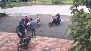 Watch the Road...Biker goes Straight up in the Air..Lands Badly
