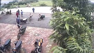 Watch the Road...Biker goes Straight up in the Air..Lands Badly