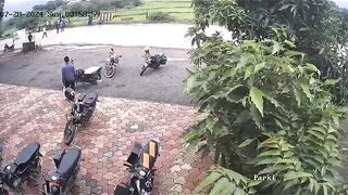 Watch the Road...Biker goes Straight up in the Air..Lands Badly
