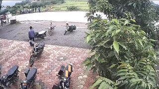 Watch the Road...Biker goes Straight up in the Air..Lands Badly