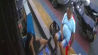 Colombia: Man sitting Relaxingh with Nervous Friend is Brutally Executed