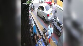 Colombia: Man sitting Relaxingh with Nervous Friend is Brutally Executed