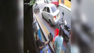 Colombia: Man sitting Relaxingh with Nervous Friend is Brutally Executed