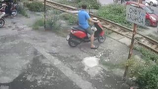 Wow: Man Drives onto Train Tracks on his own Front Yard....and just Stops
